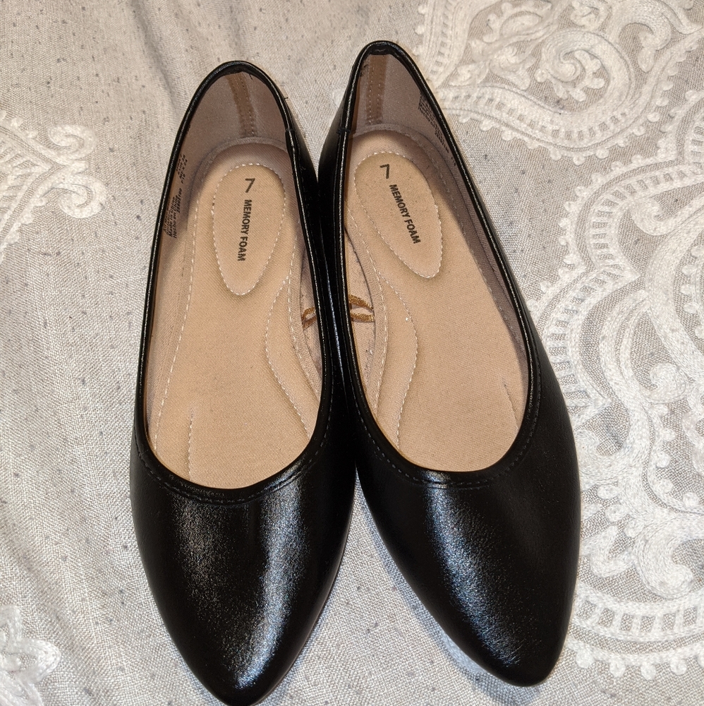 Black faux leather flats